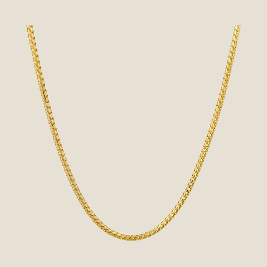 2.5MM Franco Chain in 14k solid gold with intricate, tightly interlocking links and a lobster clasp.