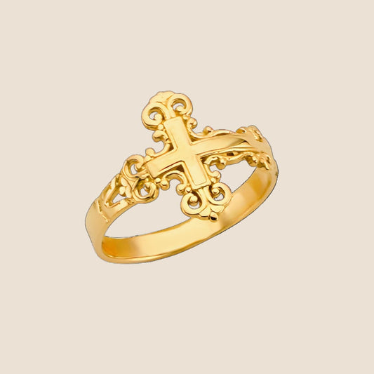 14k gold filigree cross ring with ornate scrollwork detailing on band made in USA.