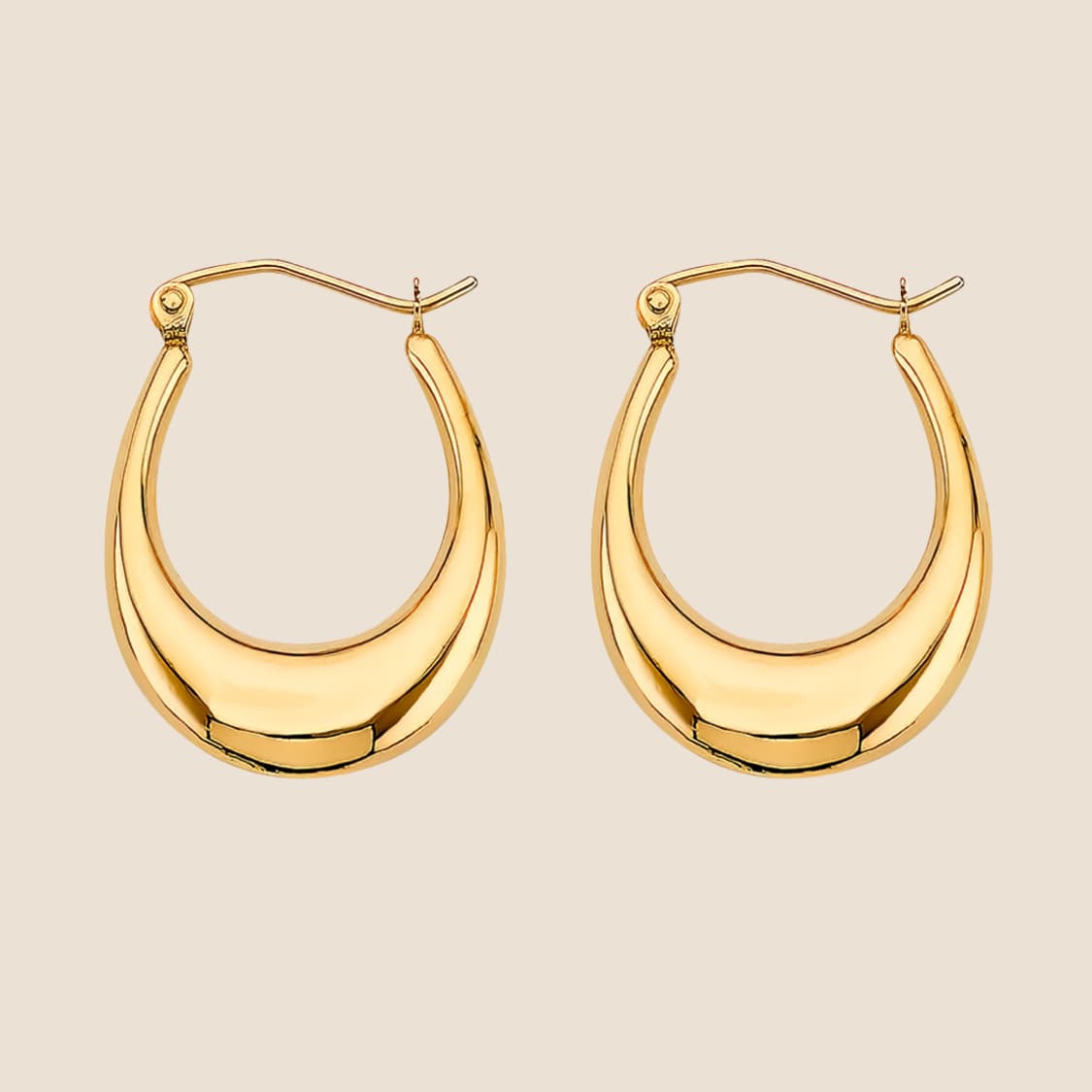 14k gold U-shaped hoop earrings with high-polish finish and bold, curved design