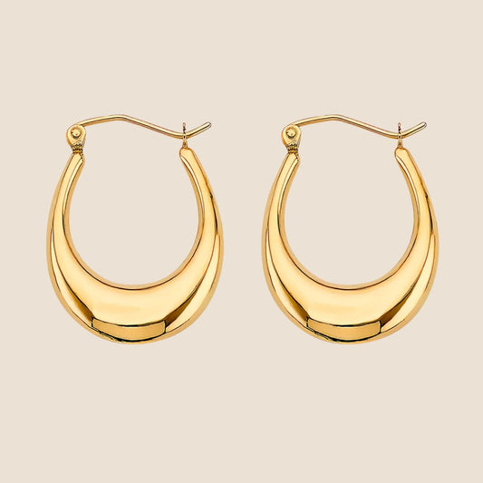 14k gold U-shaped hoop earrings with high-polish finish and bold, curved design