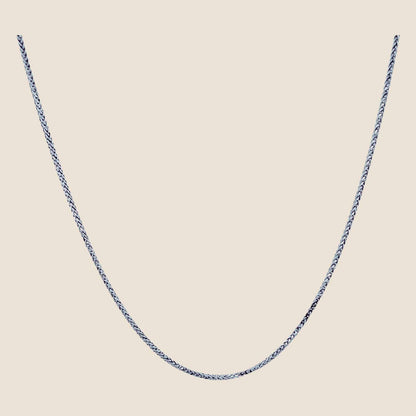 1MM Wheat Chain in 14k white gold with tightly knit weave and lobster clasp, minimalist and timeless design made in the USA.