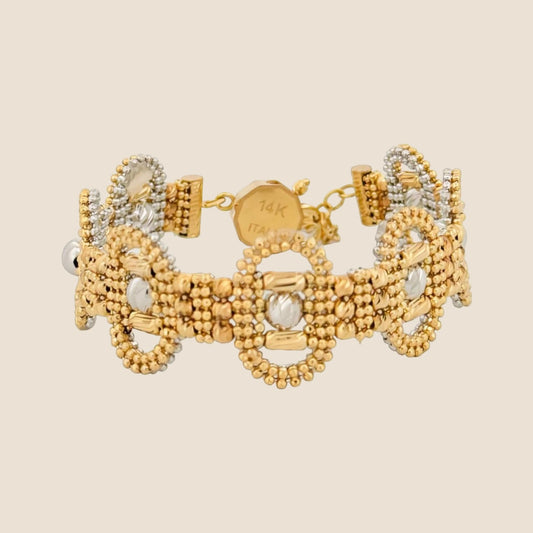 Bead stone cut bracelet with yellow and white gold finishes, 14k gold lobster clasp, and adjustable length, made in Italy.