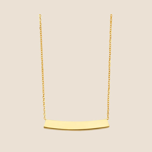 Sleek gold moving bar necklace with minimalist pendant on a delicate chain, available for engraving, 14k gold, Made in USA.