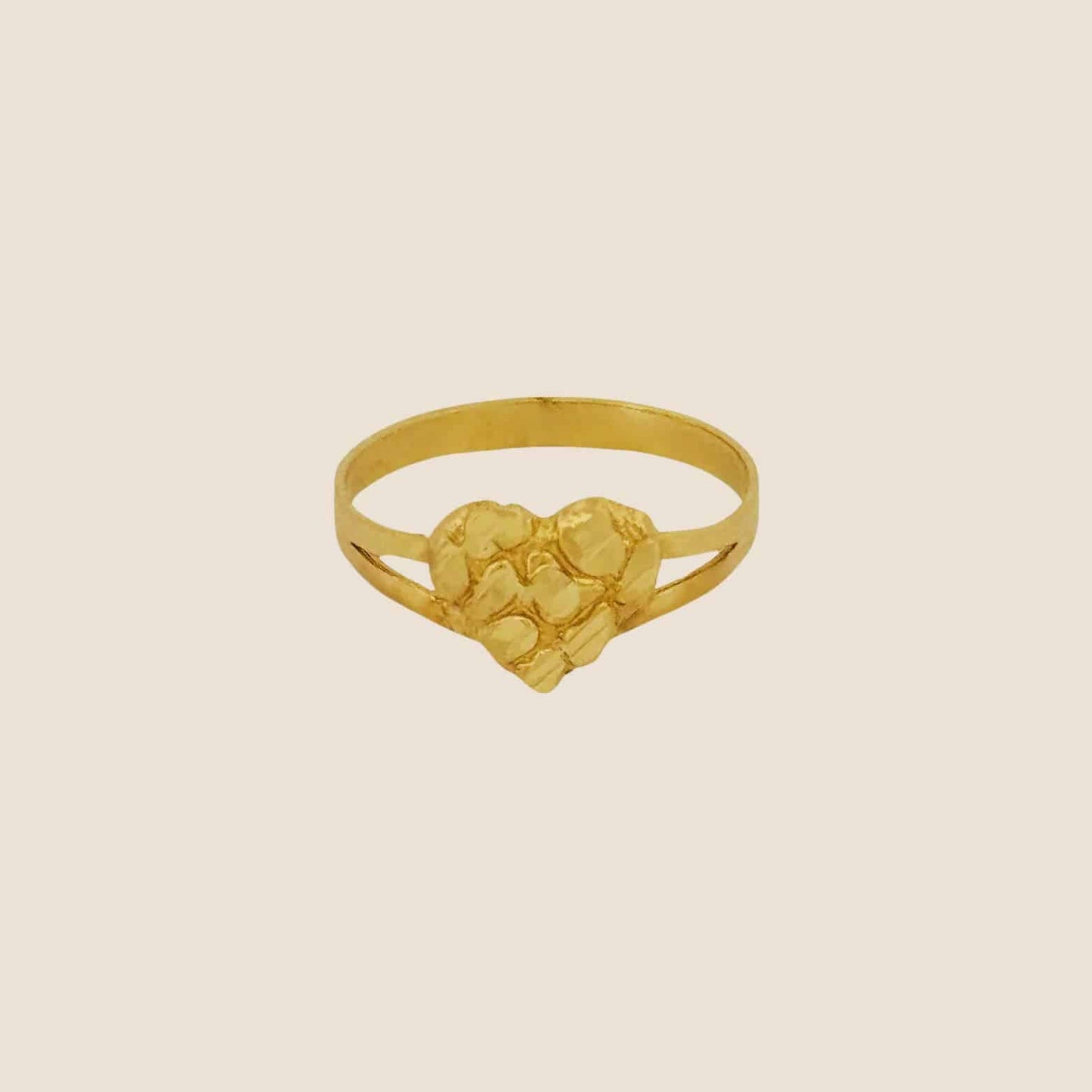 14k Heart Nugget Ring ring with richly textured golden heart, offering a tactile reminder of love and affection.