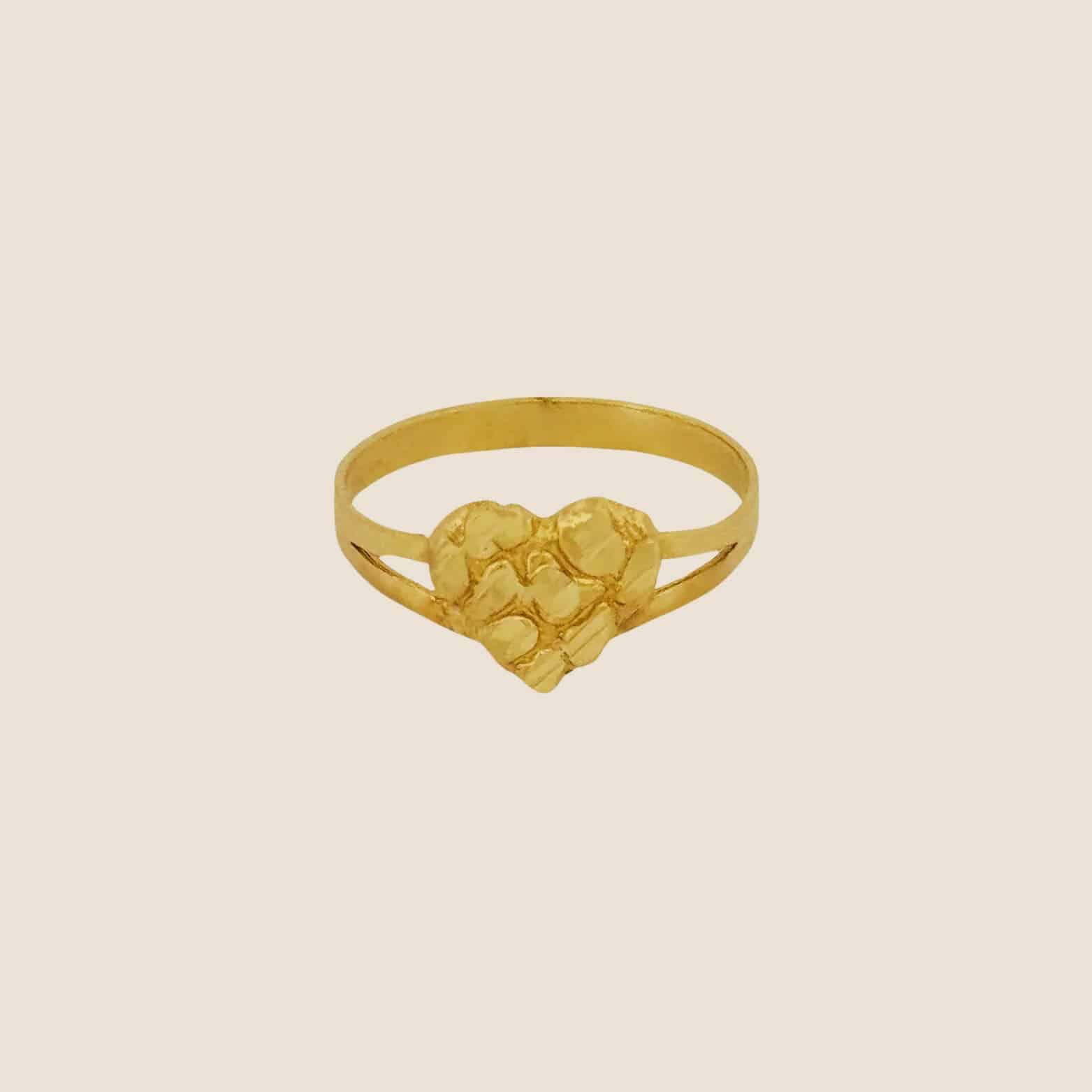 14k Heart Nugget Ring ring with richly textured golden heart, offering a tactile reminder of love and affection.