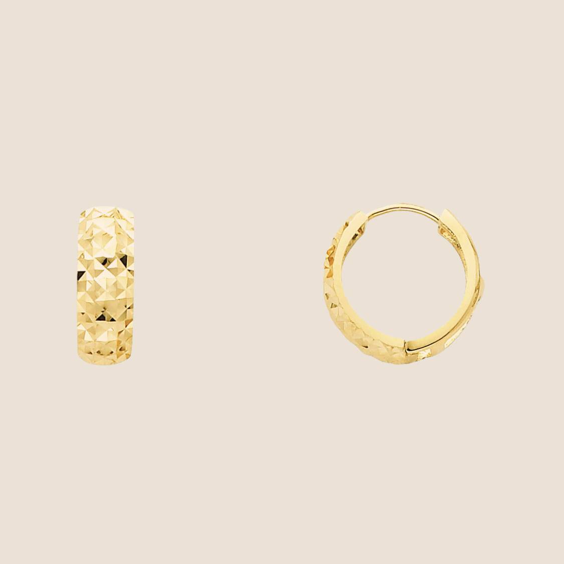 Gold D/C Huggies earrings with a textured diamond-cut pattern, 14mm tall, made in the USA, perfect for everyday wear.