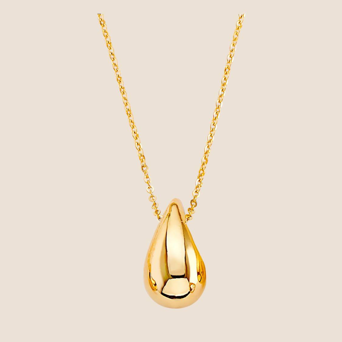 Elegant gold teardrop necklace with polished pendant on a fine chain