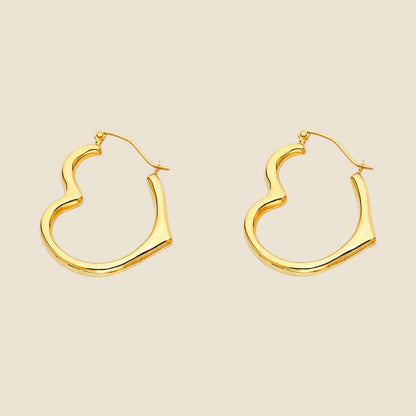 14k yellow gold heart-shaped earrings with open-heart design and smooth finish, 18.5mm tall, made in USA.