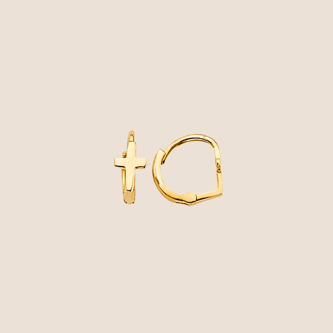 Kids gold Cross Huggies Earrings with small cross pendants on each hoop, lightweight and comfortable for everyday use, made in the USA