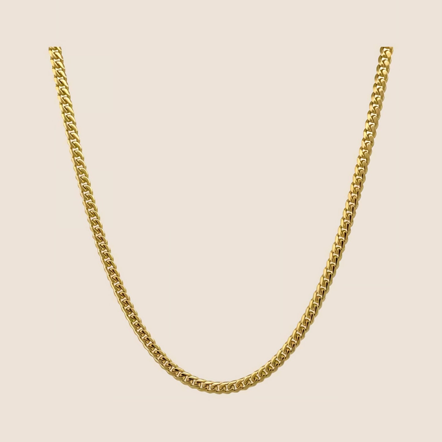 3MM Cuban Link Chain in high-quality gold with seamless construction and smooth finish, made in Italy, featuring a 14k solid gold lobster clasp.