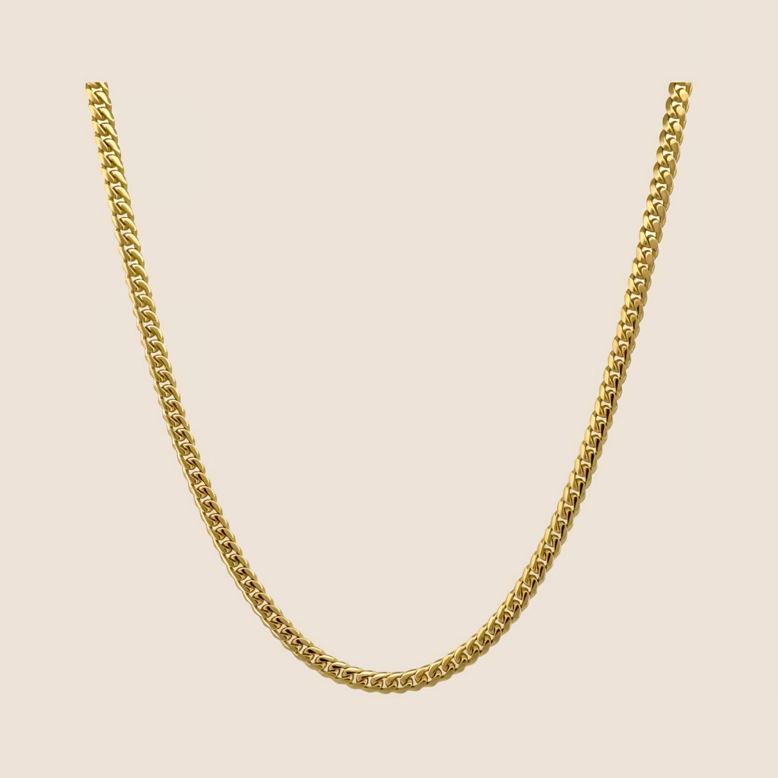 3MM Cuban Link Chain in high-quality gold with seamless construction and smooth finish, made in Italy, featuring a 14k solid gold lobster clasp.