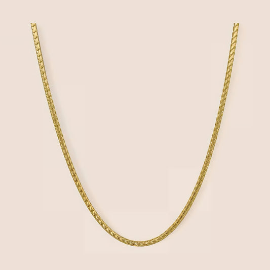 14k gold 2MM Franco Chain with tightly woven V-shaped links, diamond cut, and lobster clasp ideal for daily wear, pendants, or stacking.