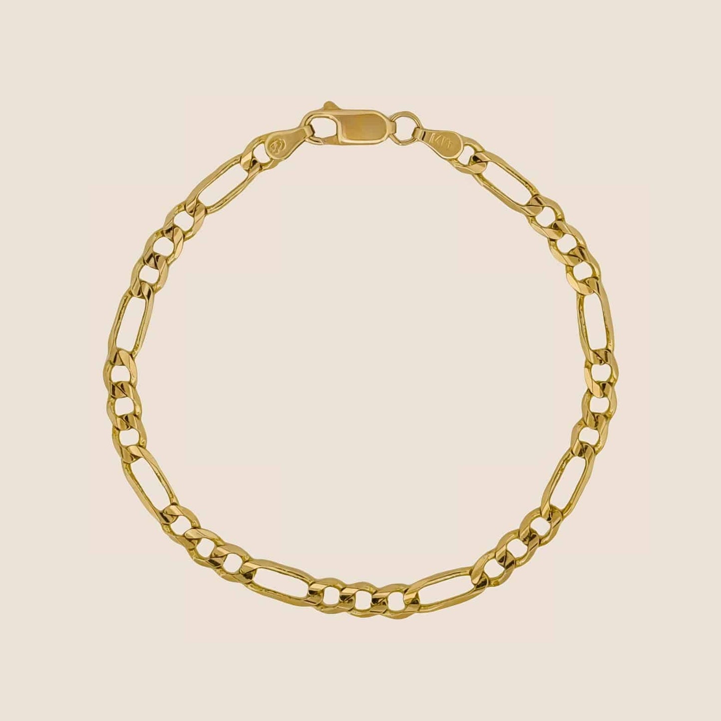 14k solid gold 4MM Figaro bracelet with lobster clasp, made in USA, displayed on a neutral background.