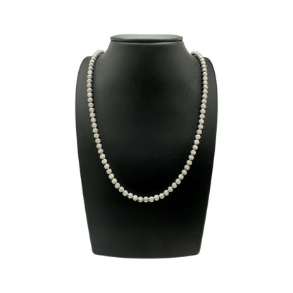 14k white gold 4MM laser moon cut chain necklace with lobster clasp on black display mannequin, made in Italy.